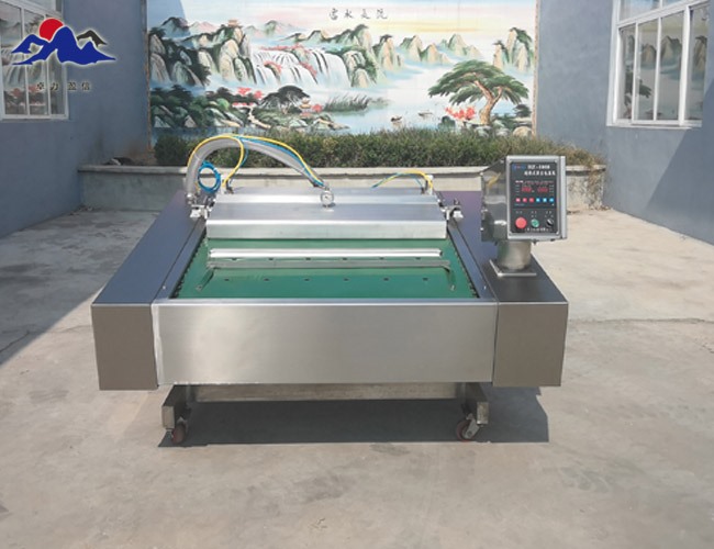 連續滾動式真空包裝機?